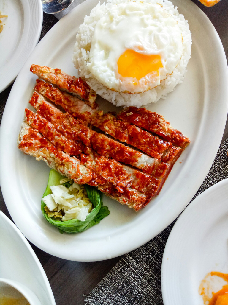 Fried Pork Slices And Egg For Breakfast